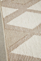 modern patterned rug on polished concrete
