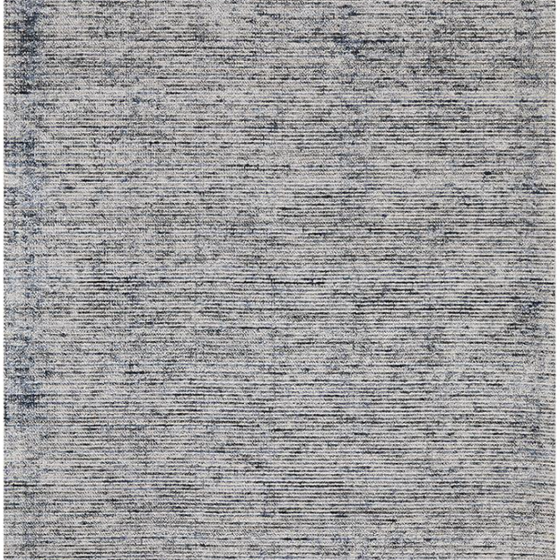 Textured gray area rug with a subtle pattern
