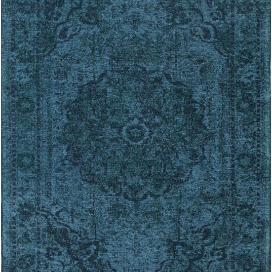 Blue patterned rug with intricate design