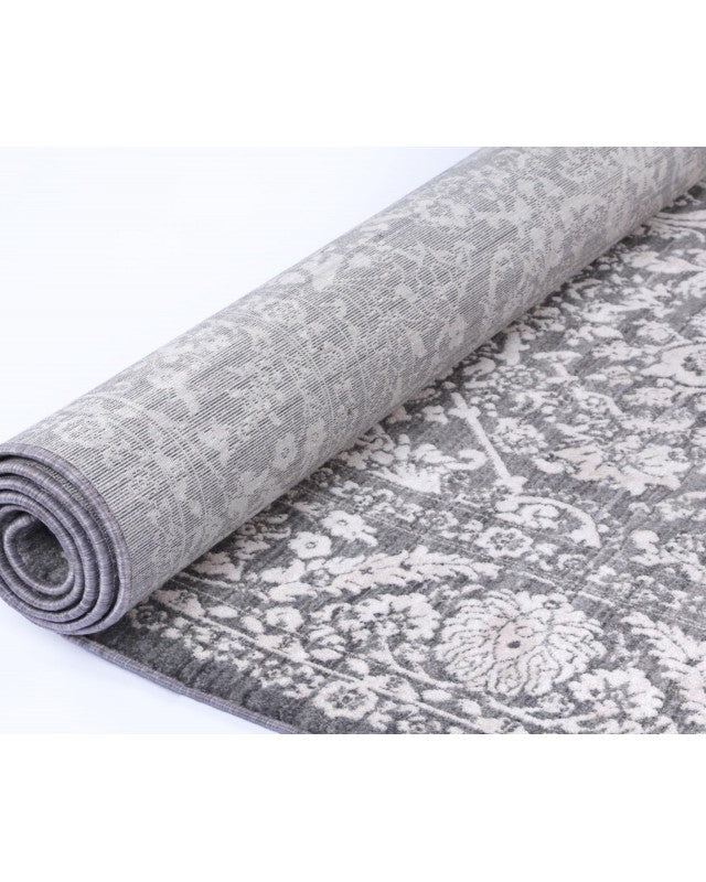 Angelika Rug Beige rolled up