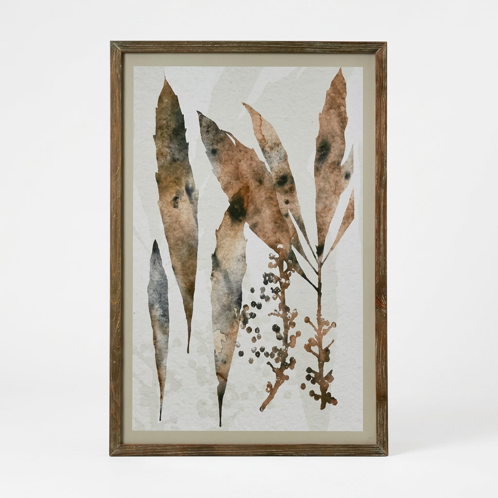 Framed botanical art print featuring watercolor-style dried leaves and small berry clusters in earthy brown, beige, and gray tones, set in a rustic wood frame against a light neutral background.