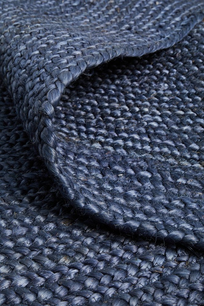 Close-up of textured blue fabric with a woven pattern