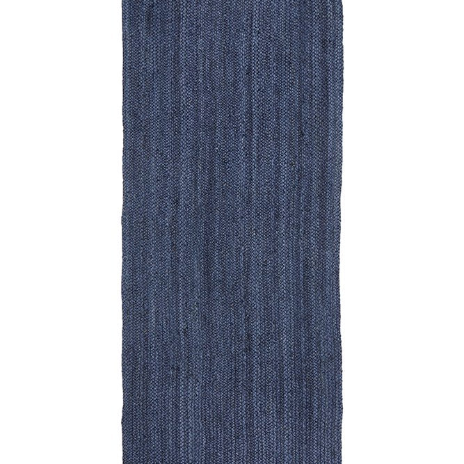 Blue textured rug on a white background