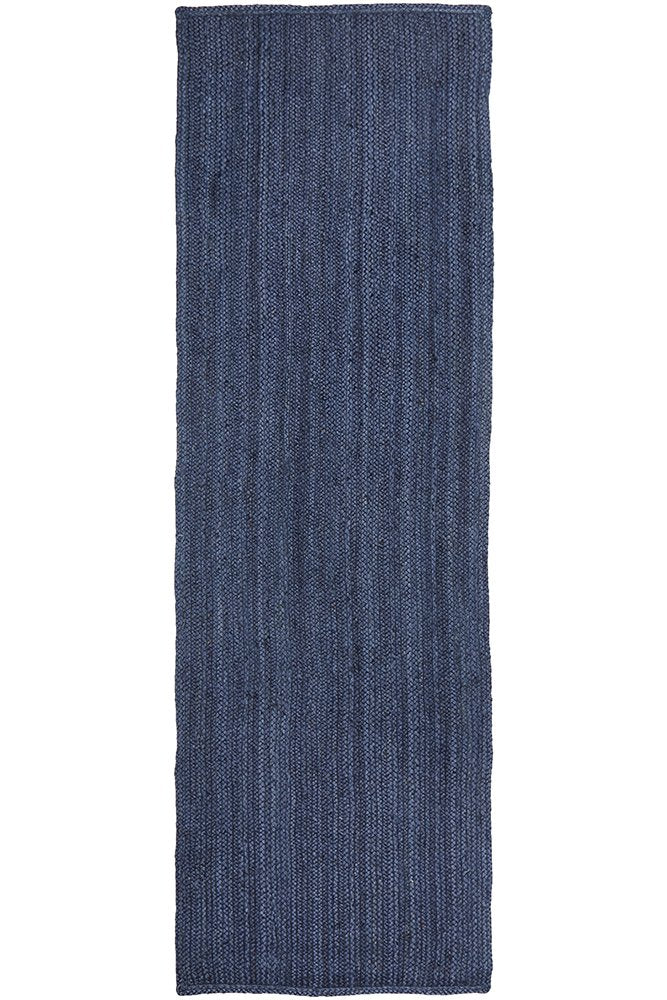 Blue textured rug on a white background