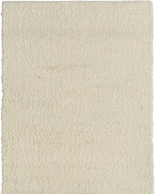 A textured looped and sheared ivory-colored handwoven wool rug