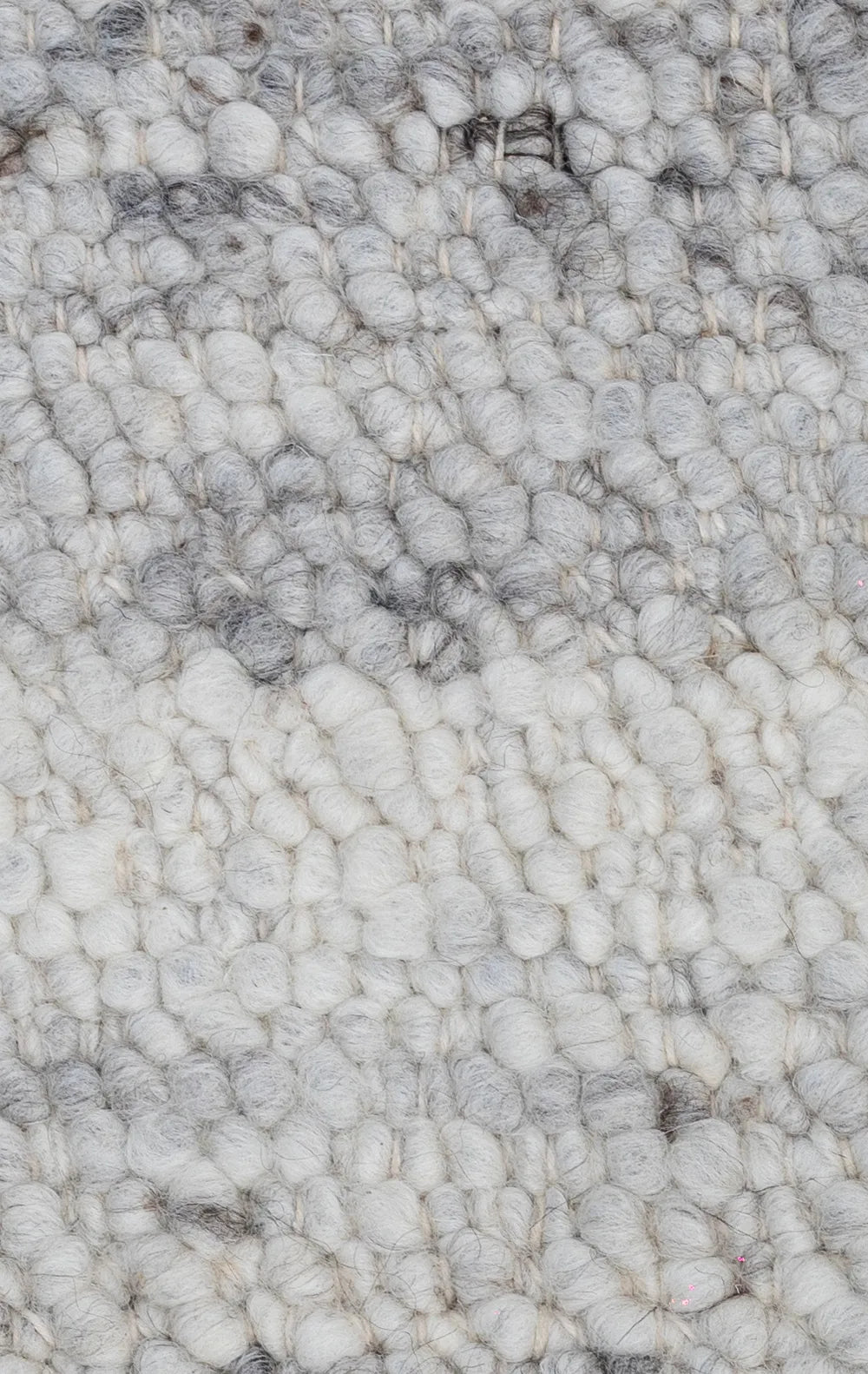 Close-up of textured gray carpet