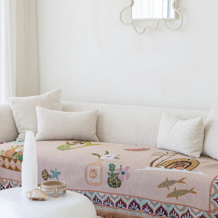 Decorative sofa with a floral pattern in a bright living room.