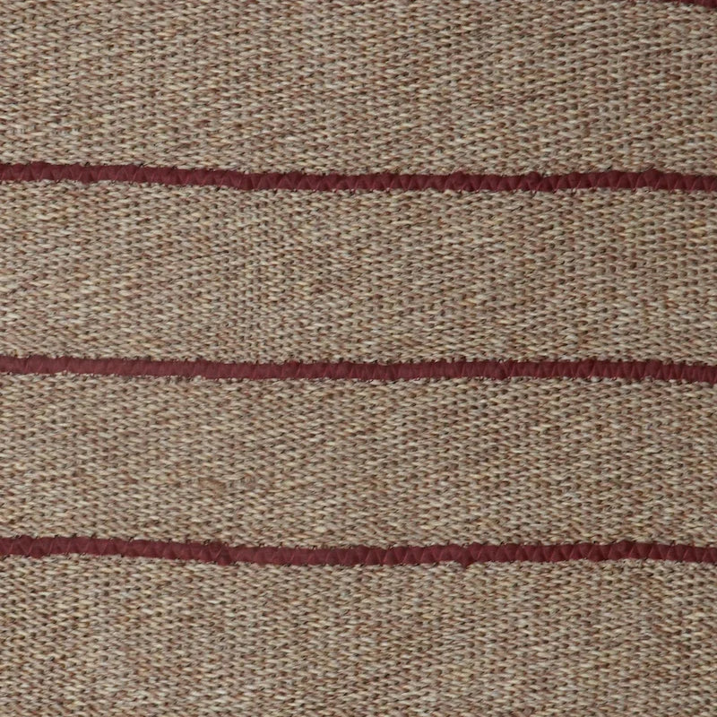 Close-up of fabric with brown stripes on a beige background