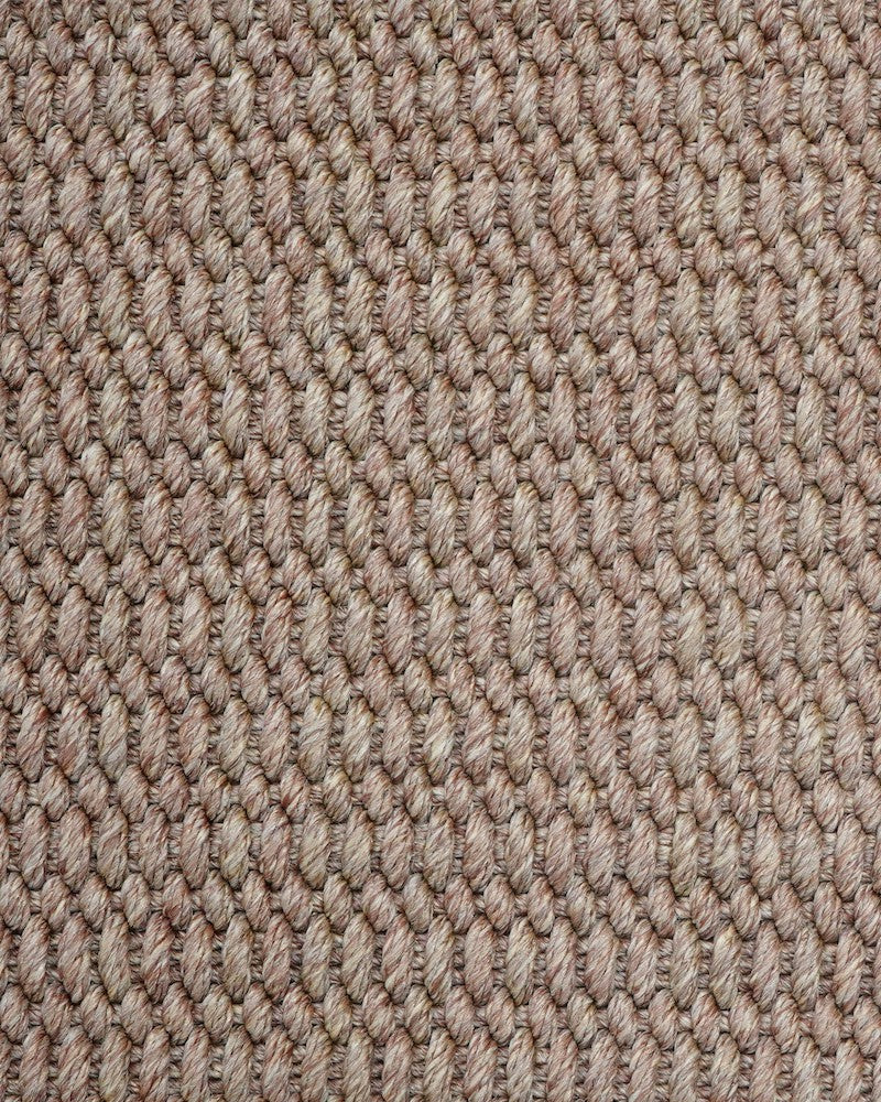 Close-up of a textured brown carpet