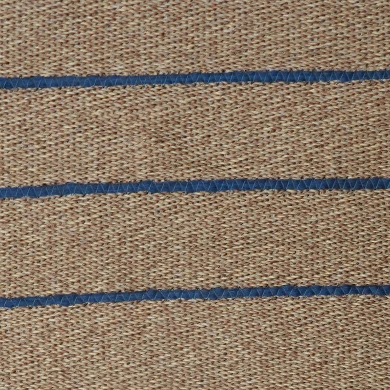Textured fabric with blue stripes on a brown background