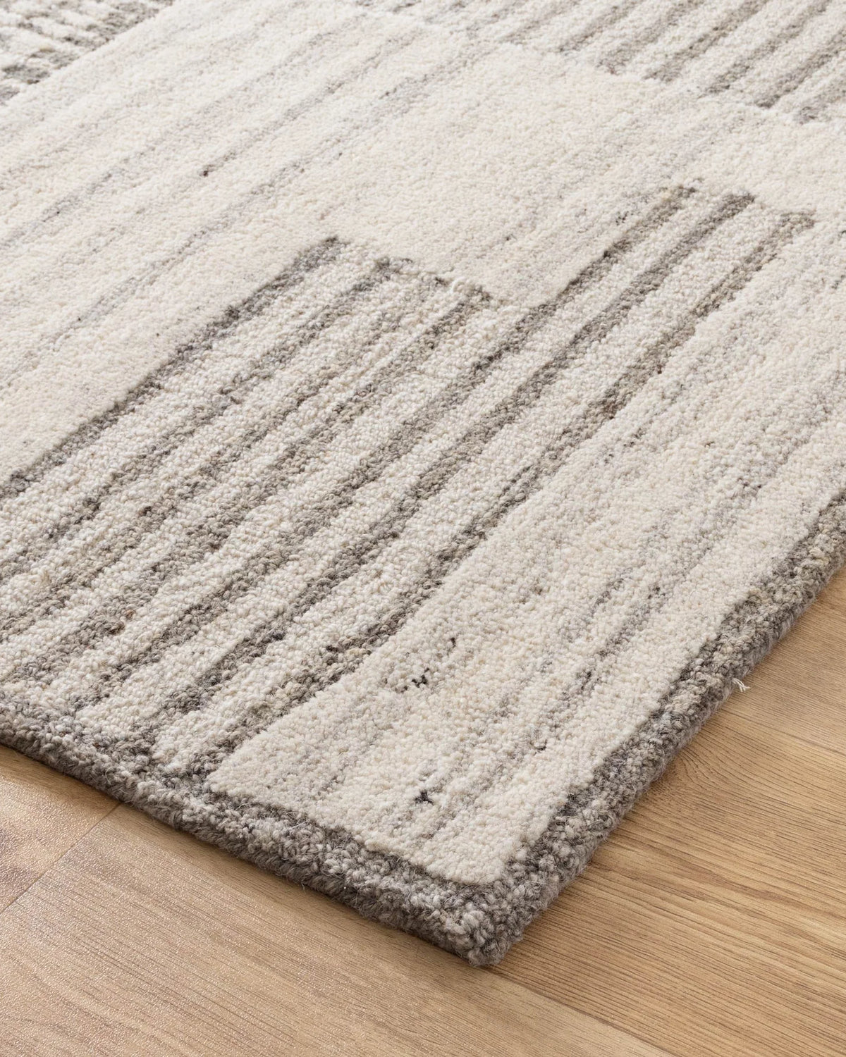 Textured area rug on a wooden floor