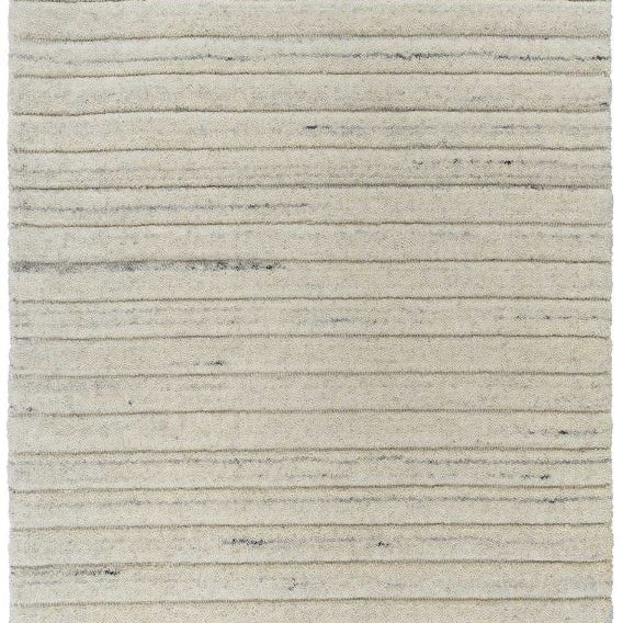 Textured area rug with a ribbed pattern on a white background