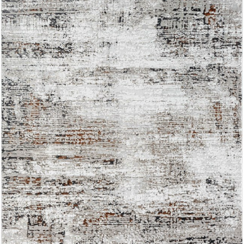 Textured area rug with abstract pattern on a white background