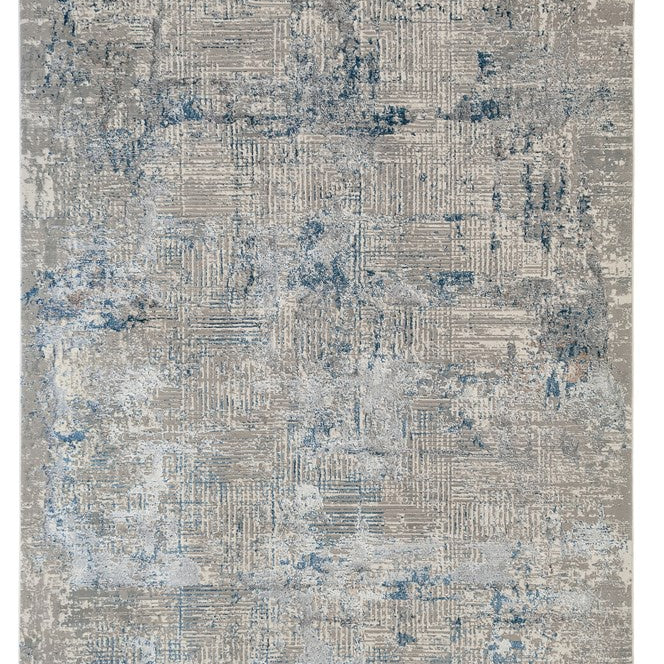Textured area rug with blue and gray pattern on a white background