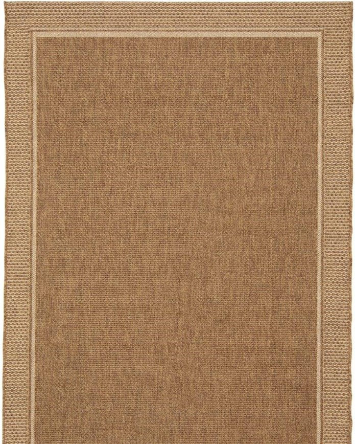 Beige area rug with a subtle pattern