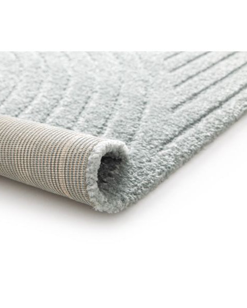 Textured gray rug on a white background