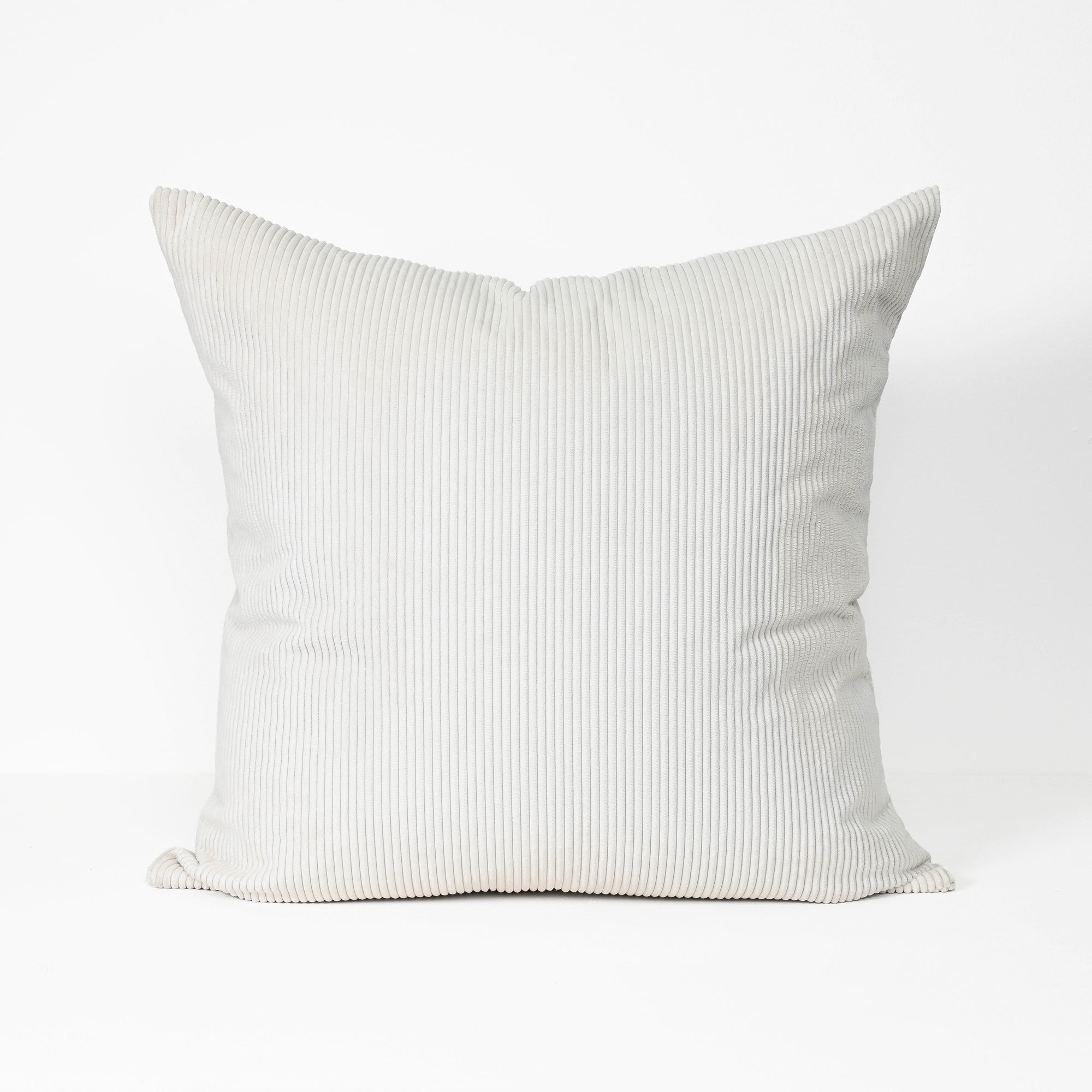 A square throw pillow in a light gray ribbed corduroy fabric, shown against a plain white background.