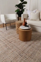 Dune Ivory Rug displayed in a room with neutral decor, accentuating its versatility and natural aesthetic.