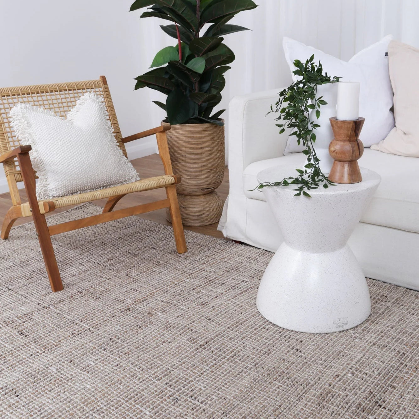 Dune Jute & Wool Rug placed in a coastal-themed room, emphasizing its compatibility with serene, beach-inspired decor.