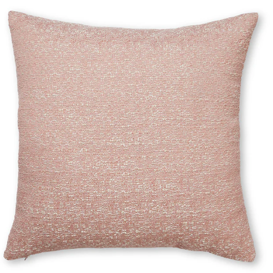 Pink textured pillow on a white background