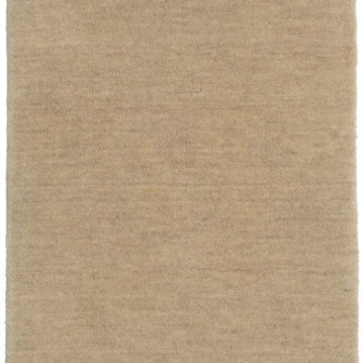 A beige, textured wool rug with a subtle tie-dye effect, displayed on a plain background.