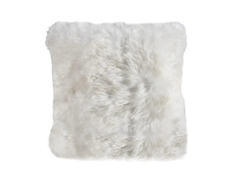 White sheepskin cushion pillow on a white background