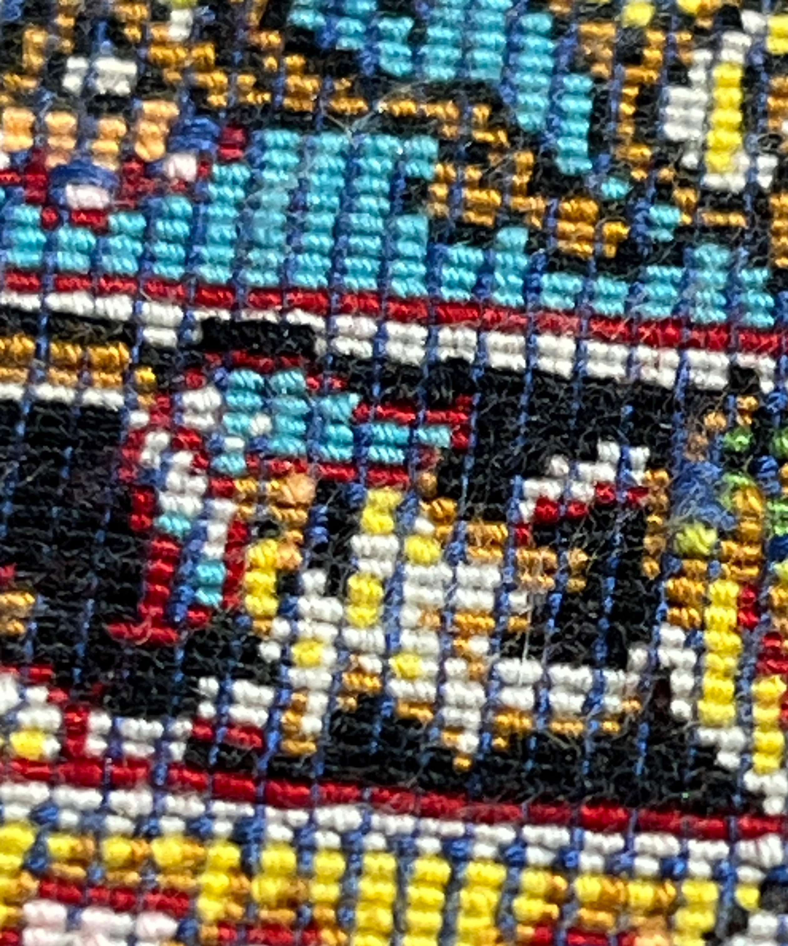 Close-up of a colorful woven fabric with patterns