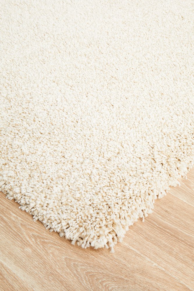 Detailed view of the Laguna Rug's rich texture in cream, highlighting the quality polypropylene and plush 40mm pile.