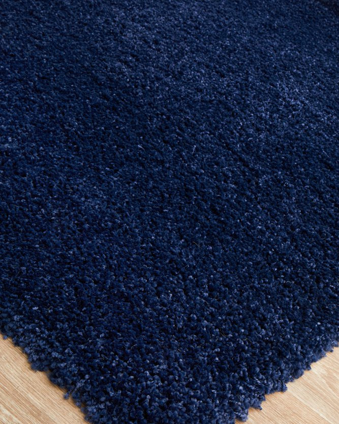 Detailed view of the Laguna Rug's texture in Denim, highlighting the quality polypropylene and its plush 40mm pile.