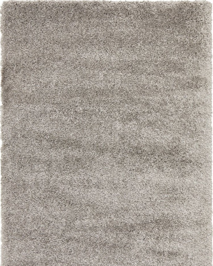 Entire view of the Laguna Rug in a refined Silver shade, showcasing its modern design and luxurious texture.