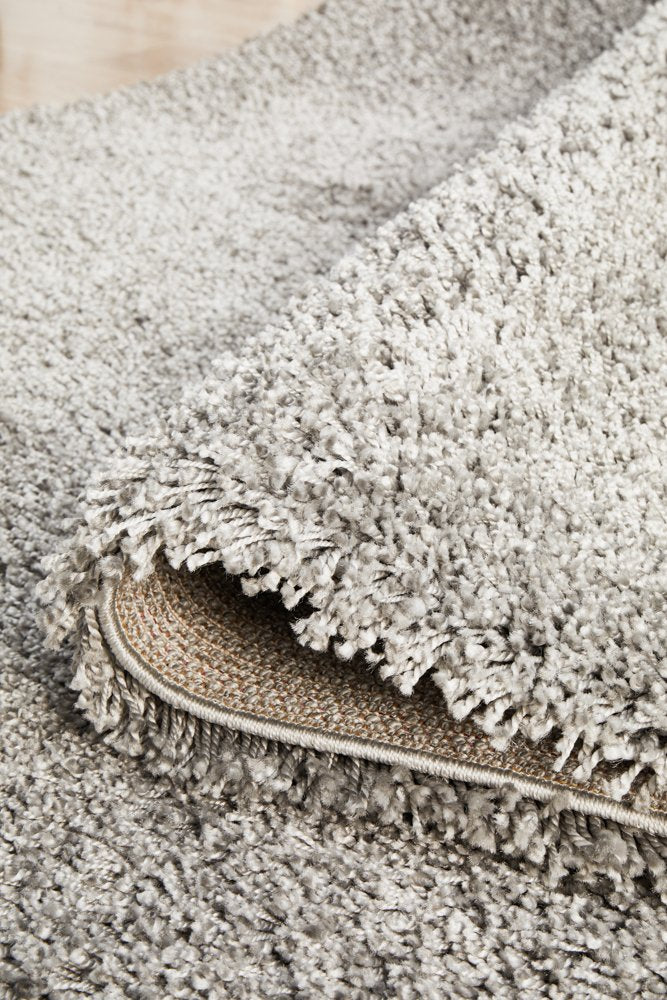 The Laguna Rug in Silver under natural lighting, enhancing the elegant silver hue and the luxurious feel of the rug.