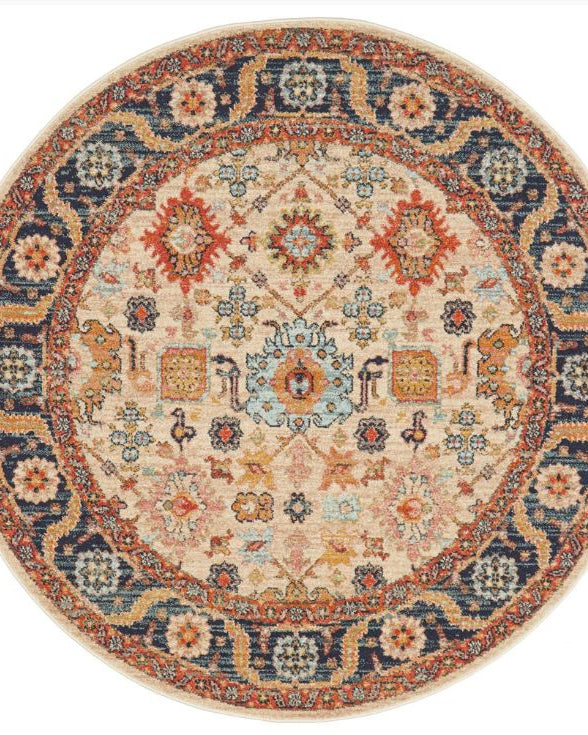Round decorative rug with intricate patterns on a white background