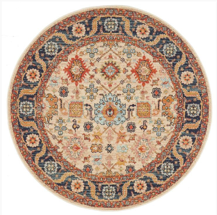 Round decorative rug with intricate patterns on a white background