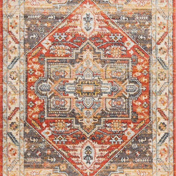Complete image of the Legacy Rug in a rich Terracotta shade, displaying its tribal-inspired geometrical patterns.