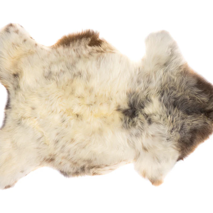 Fur rug with natural pattern on a white background