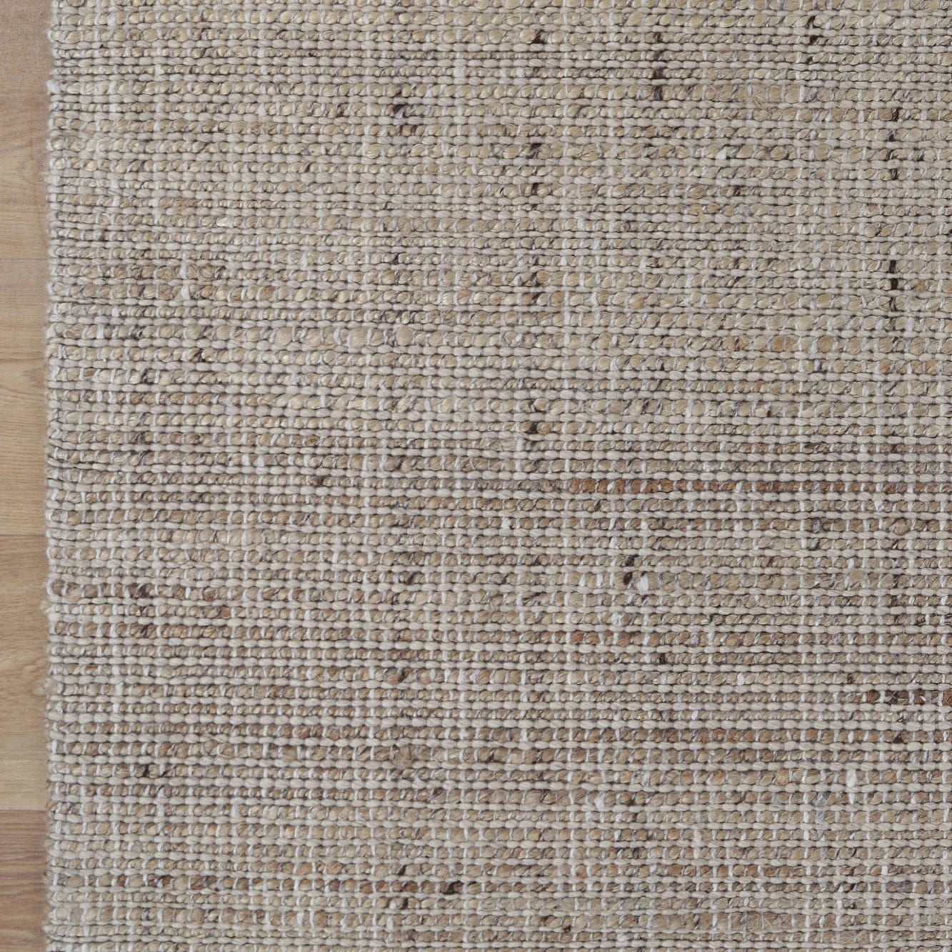 Zoomed-in view showing the hand-knotted technique of the Dune Rug, illustrating the craftsmanship and quality.