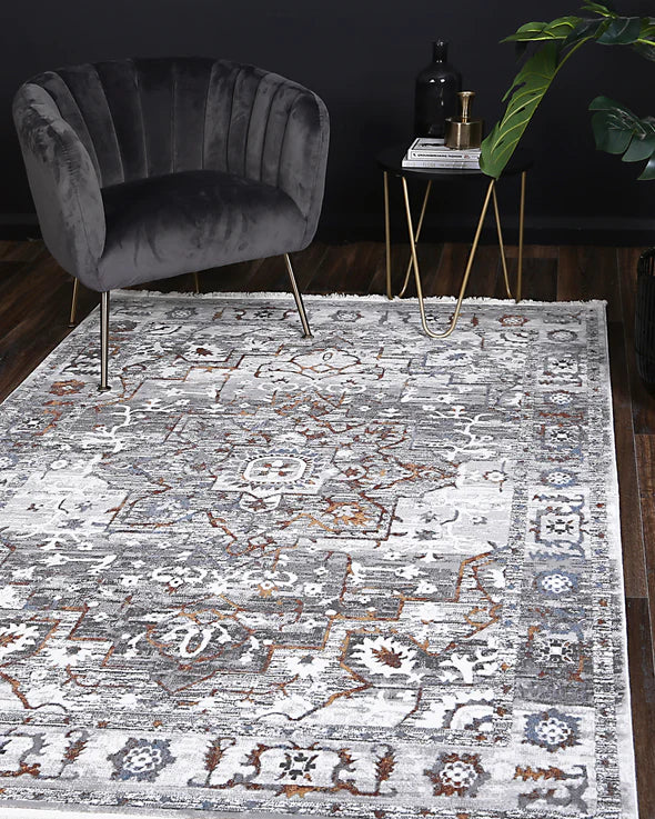 Elevate your home decor with the Bohemian Paradise Rug, elegantly displayed in a contemporary setting. Its harmonious color blend and durable design provide a perfect mix of style and functionality.