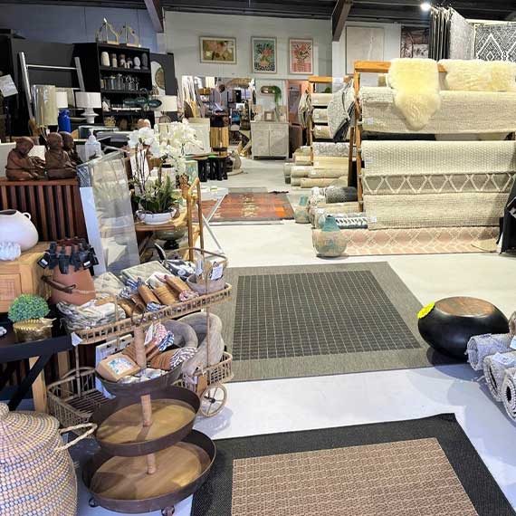 sunshine coast showroom featuring rugs, mats and homewares.