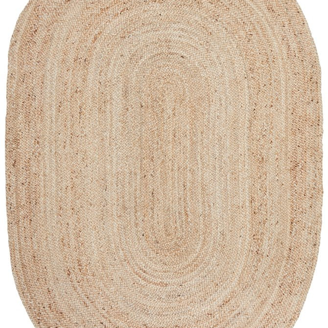 Beige braided rug on a white background