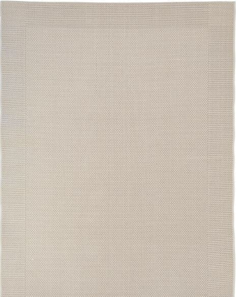 Beige area rug with a subtle pattern on a plain background