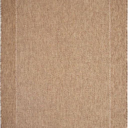 natural area rug with a subtle pattern on a plain background