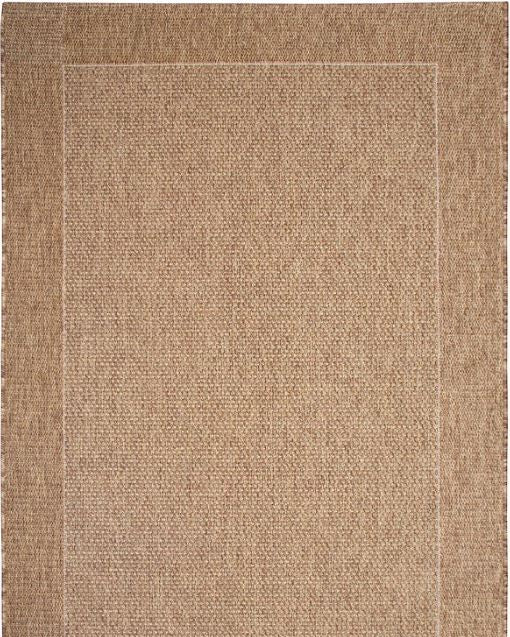 natural area rug with a subtle pattern on a plain background