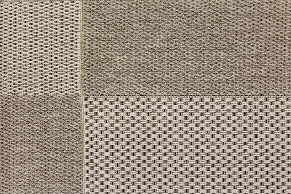 Textured woven pattern in shades of brown and beige