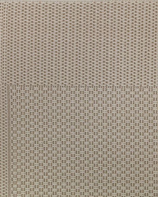 Textured beige patterned fabric swatch