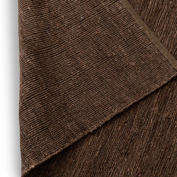 Close-up of brown fabric with a textured pattern