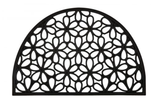 Decorative metal half-circle with floral pattern on a white background