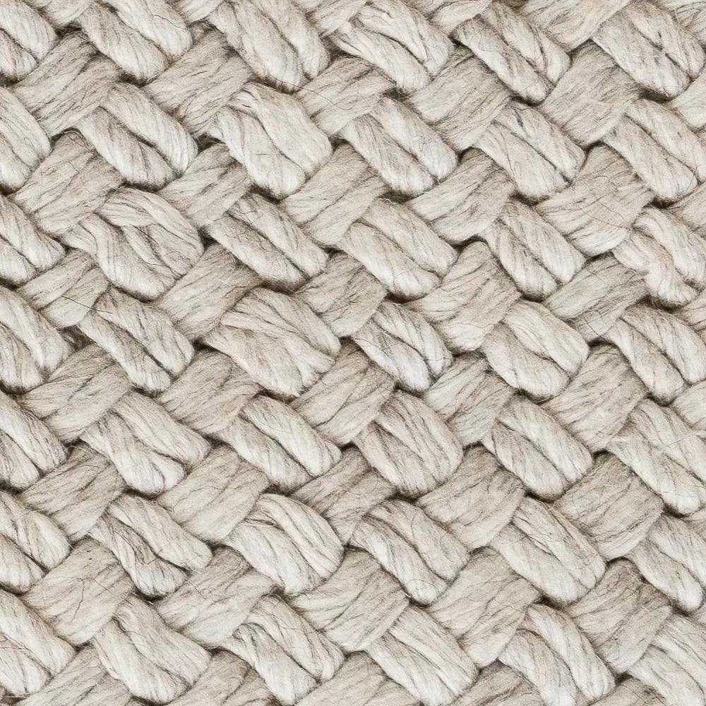 Close-up of woven beige fabric texture