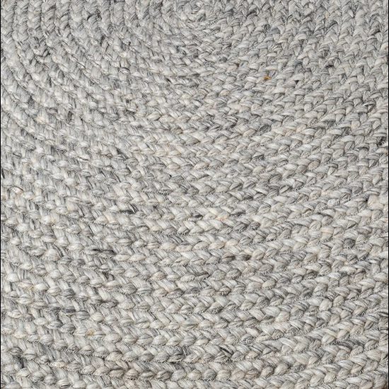 Round rug on timber flooring