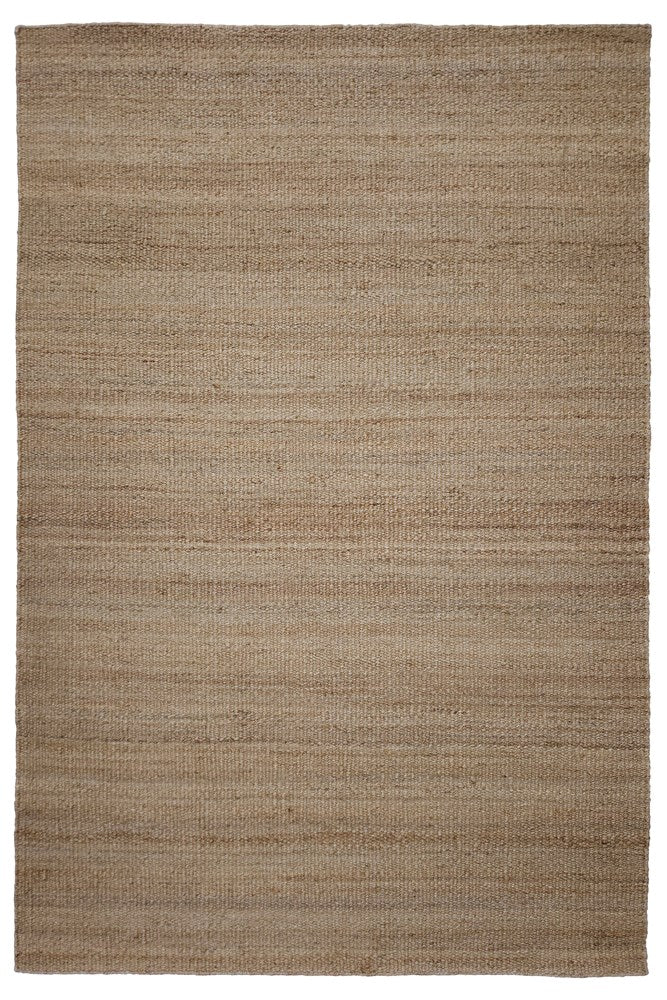 Beige area rug with a textured pattern on a white background