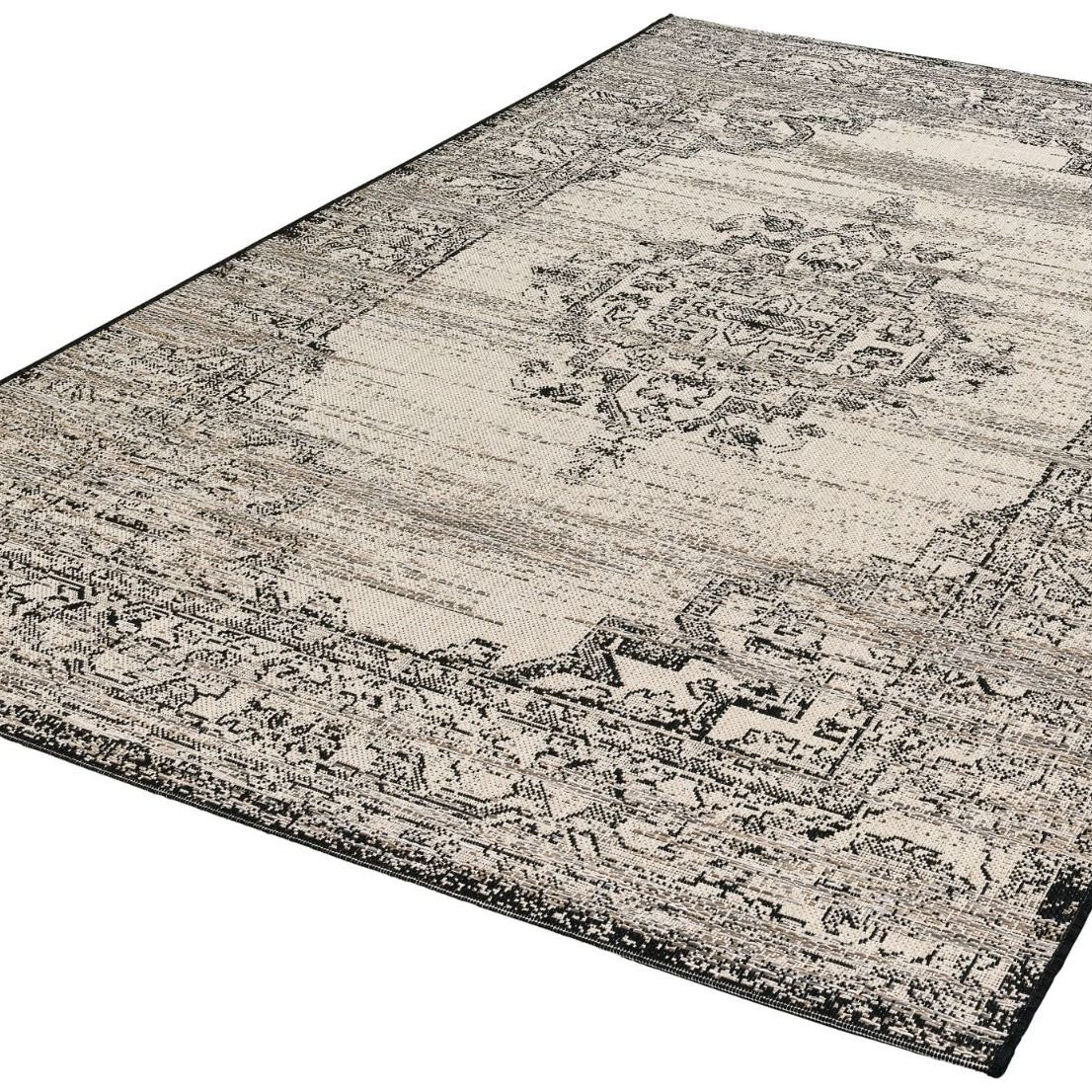 Decorative rug with intricate patterns on a plain background